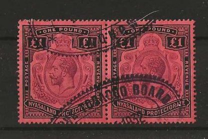 Nyasaland 1913 GV One Pound pair SG 98 fiscally used by the Tobacco Board